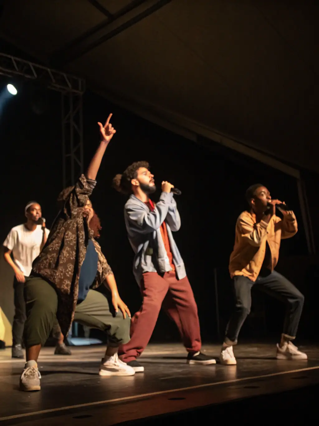 A dynamic image showcasing a live multidisciplinary performance supported by LA CUVE, featuring a fusion of music, dance, and visual arts, captivating a diverse audience and promoting cultural exchange.